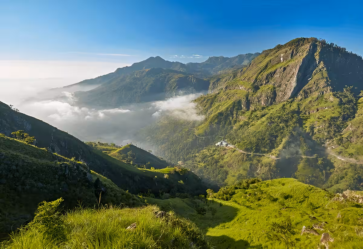 What to Do in Sri Lanka in October & November 14 Misty mountains and green valleys of Ella Gap in Sri Lanka's hill country
