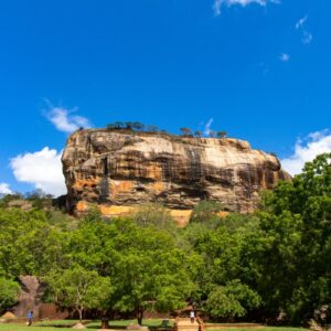Sigiriya rock rising above the forest